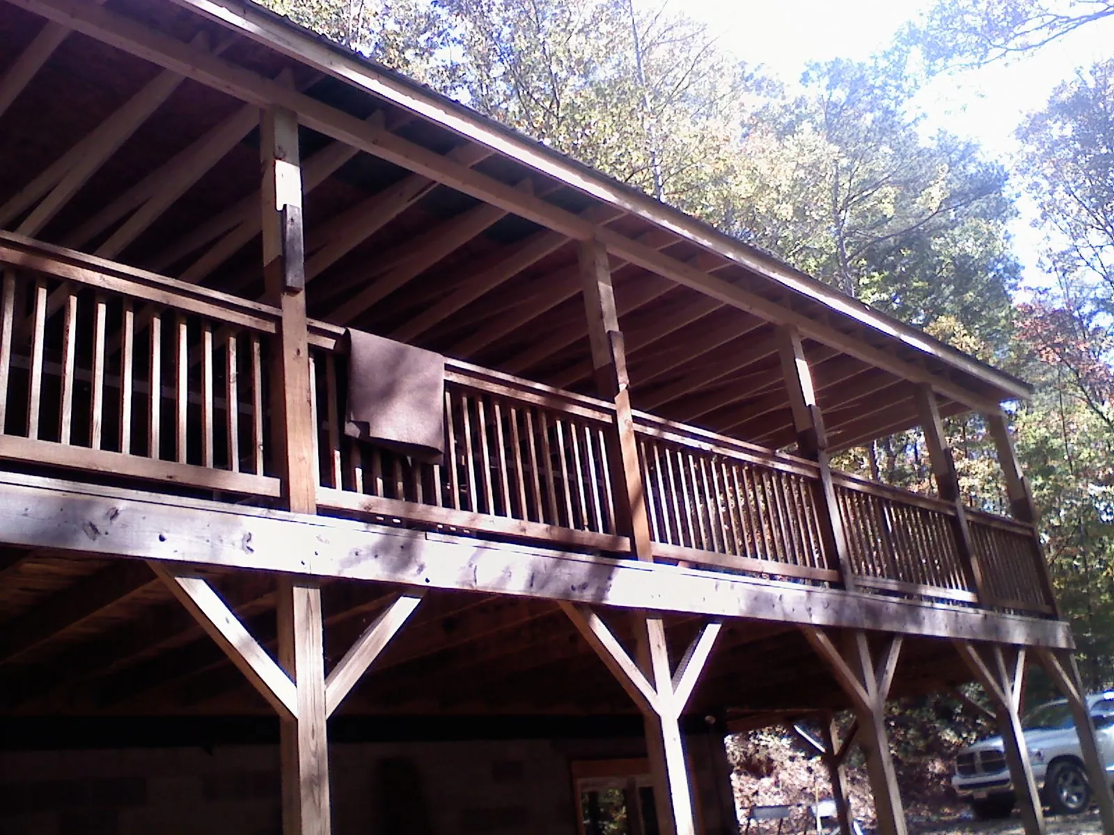 Timber framing under a new elevated porch and deck — Roof Leak Repair in Oldenburg by Roofing Brothers